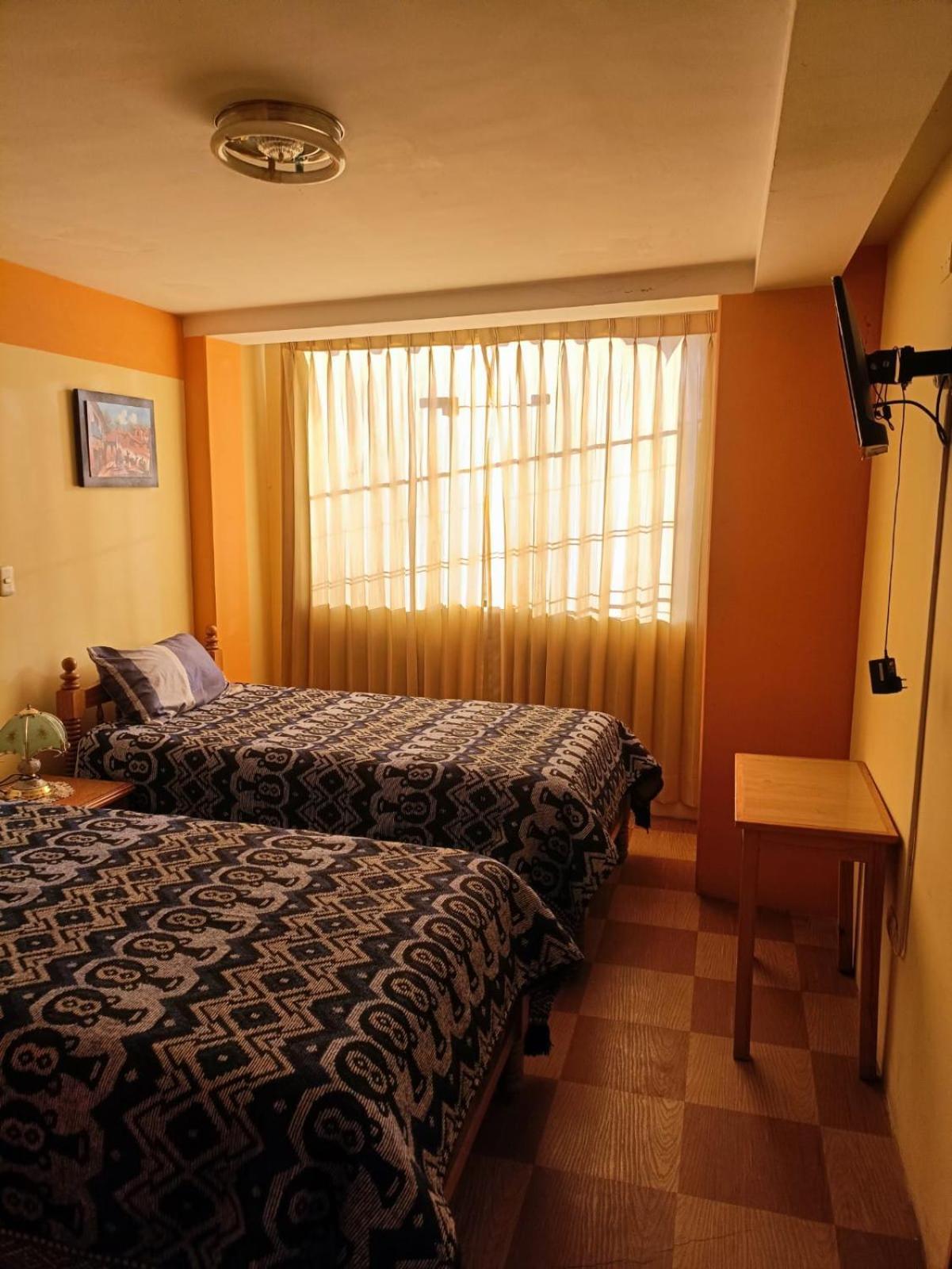 Hostal Vista Al Lago Titicaca ปูโน ภายนอก รูปภาพ