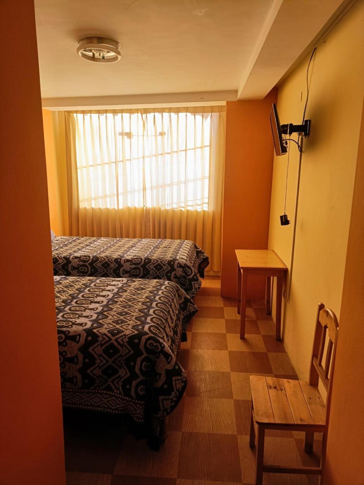 Hostal Vista Al Lago Titicaca ปูโน ภายนอก รูปภาพ
