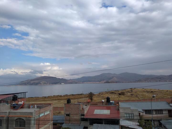 Hostal Vista Al Lago Titicaca ปูโน ภายนอก รูปภาพ