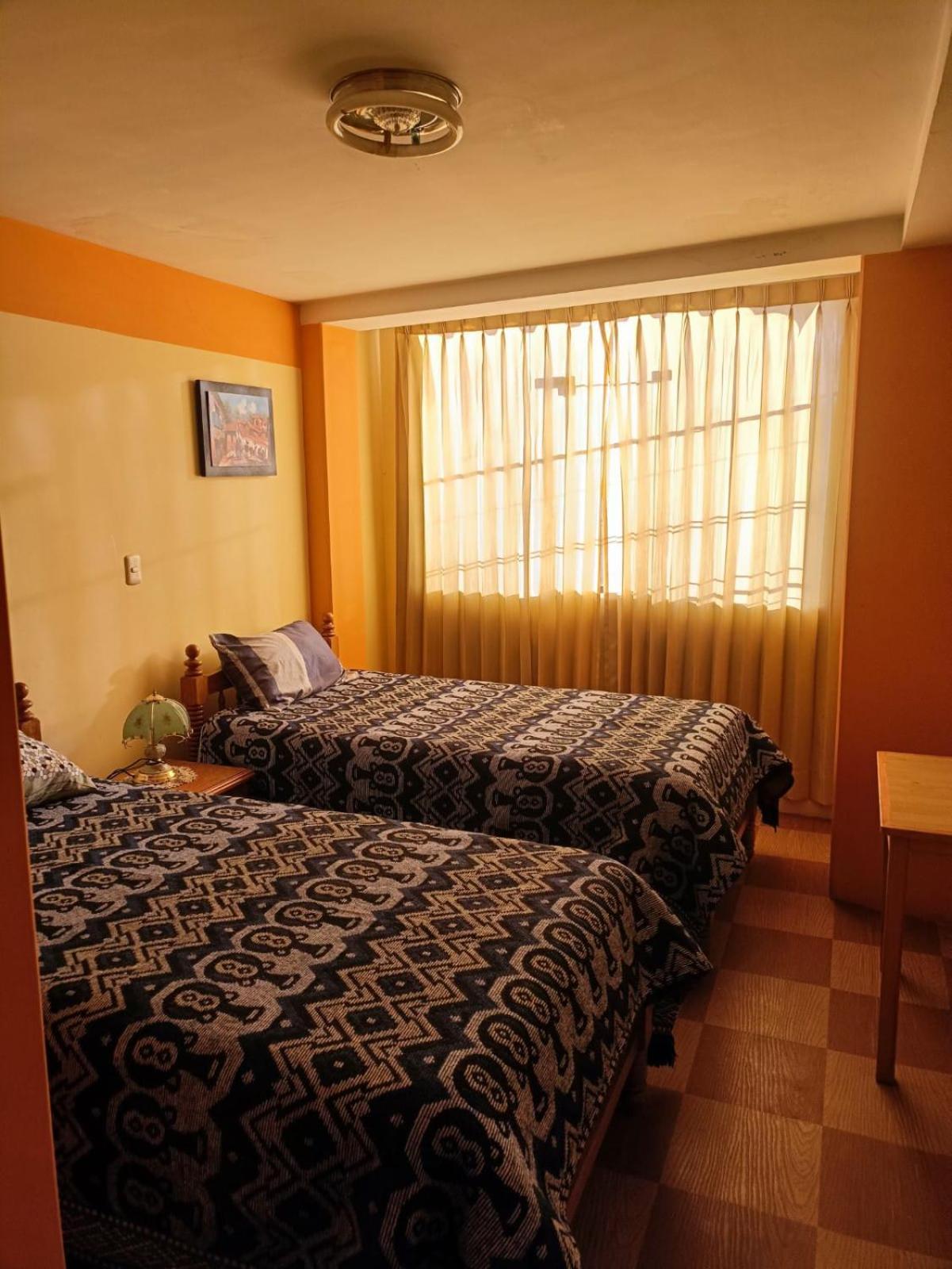 Hostal Vista Al Lago Titicaca ปูโน ภายนอก รูปภาพ