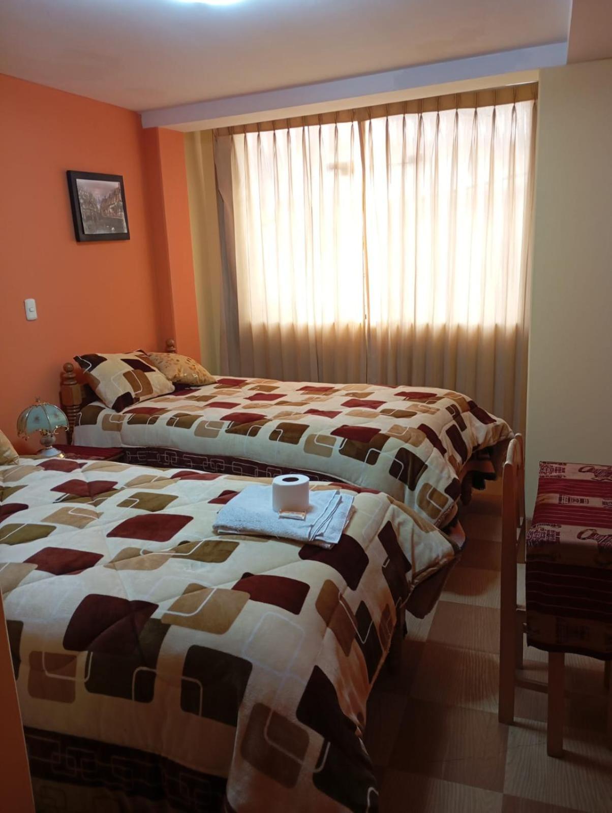 Hostal Vista Al Lago Titicaca ปูโน ภายนอก รูปภาพ