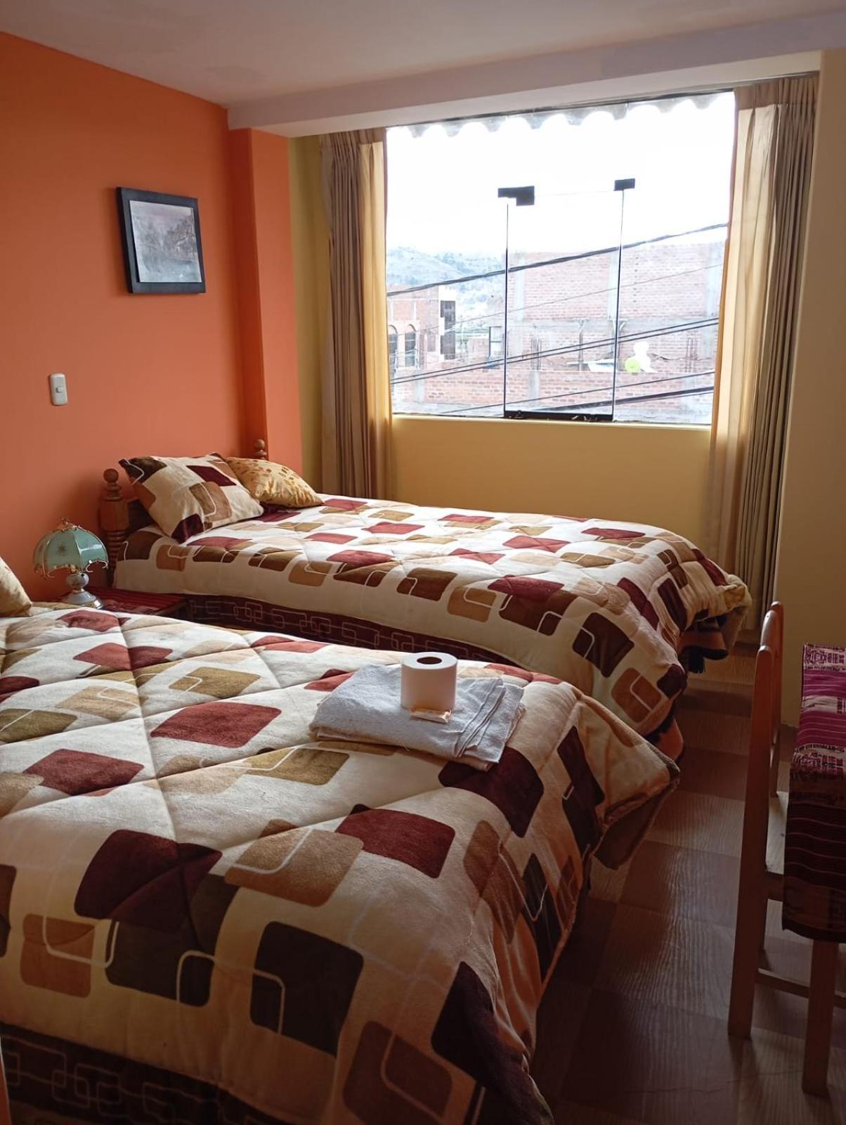 Hostal Vista Al Lago Titicaca ปูโน ภายนอก รูปภาพ