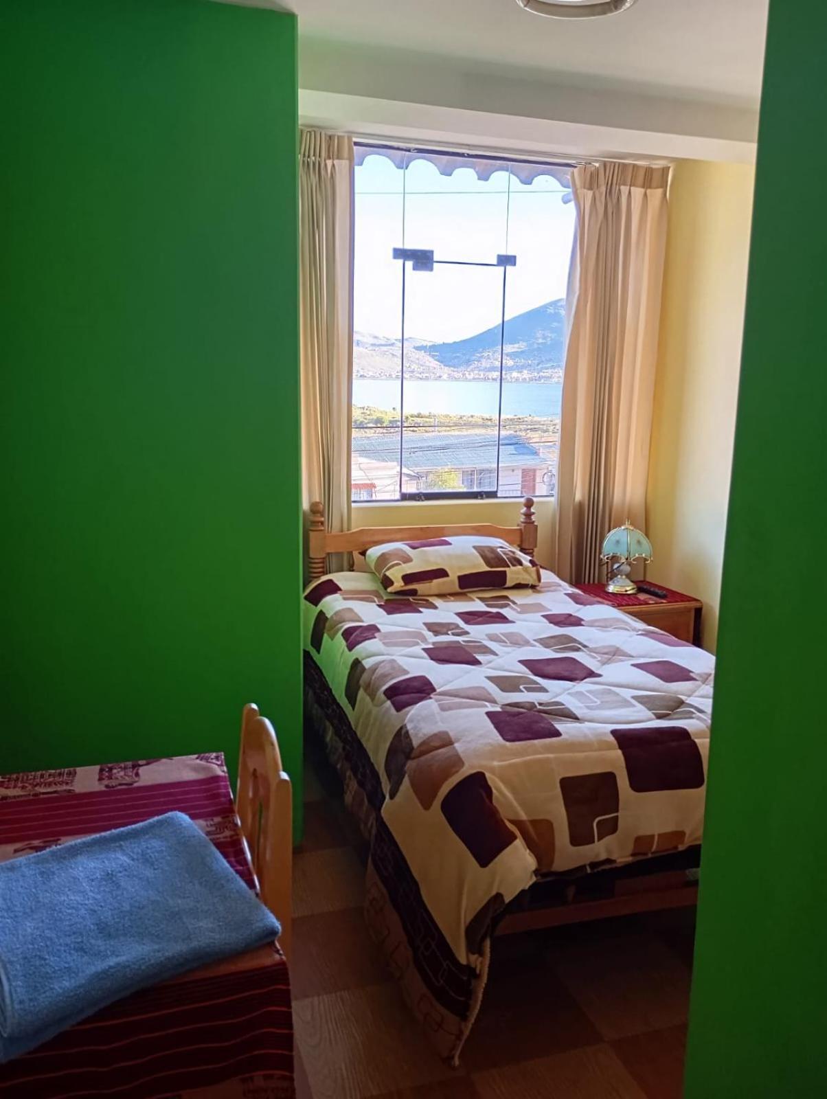 Hostal Vista Al Lago Titicaca ปูโน ภายนอก รูปภาพ